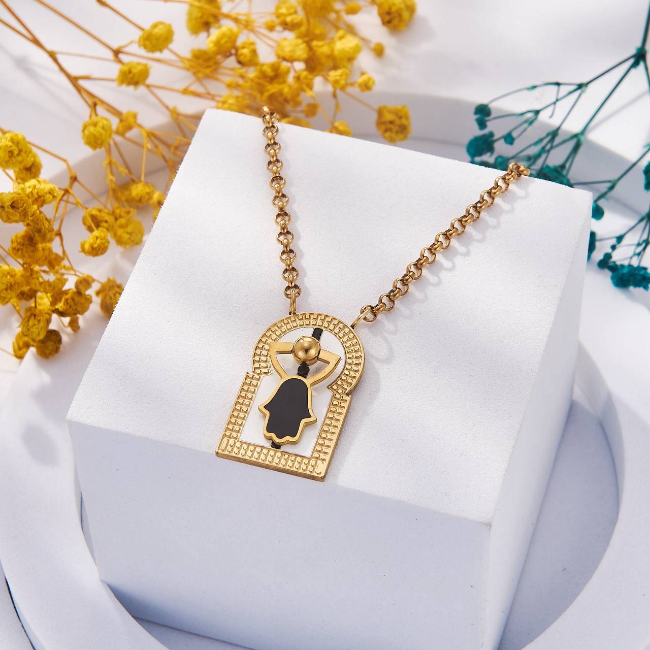 Collier Porte-Bonheur Main de Fatma Rotative en Acier Inoxydable ✨