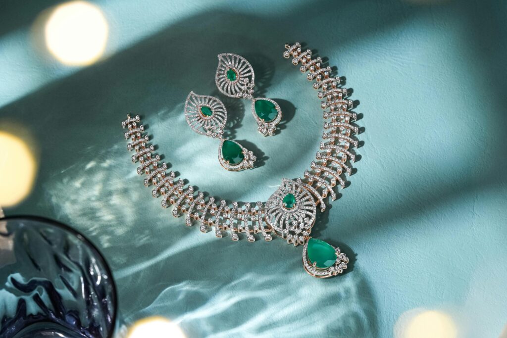 Dazzling diamond and emerald jewelry set beautifully showcased, perfect for festive occasions.
